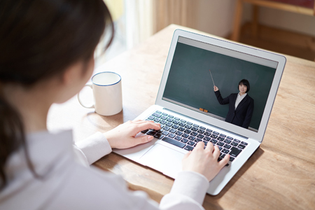 Asian woman taking online classes