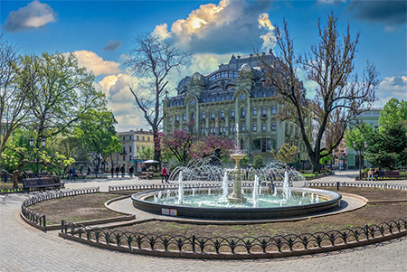 Fountain in the City garden in Odessa during the war in Ukraine on a sunny spring day