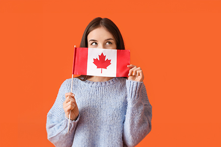 young woman with Canadian flag