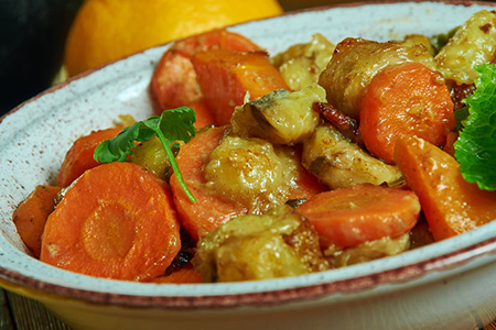 Cameroonian national cuisine - chicken and carrots in bowl