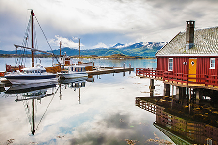 traditional fisherman houses rorbu and boats at Haholmen island, Norway