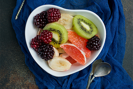 salad with fresh berries and fruits in bowl