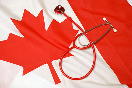 stethoscope on canada flag