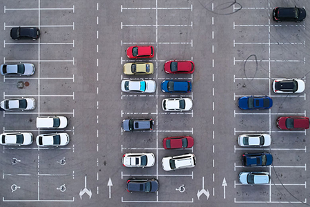 Car parking lot viewed from above, Aerial view. Top view