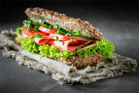 Fresh sandwich with ham, chive and cheese for breakfast