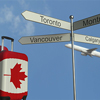 Travel baggage featuring flag of Canada, airplane and city sign post. Canadian tourism conceptual 3D