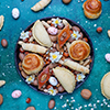 Traditional Azerbaijan holiday Novruz cookies baklavas and shakarburas on black tray plate on dark b