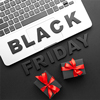 concept - black friday assortment on black background