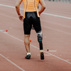 disabled male athlete running on track