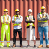 Portrait of an engineer checking products at an industrial container yard