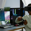 a girl player holding joystick playing videogame using VR