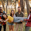 Multiracial group of friends having fun in a park