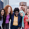 Multiracial happy friends having fun outdoor in city