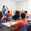 Female High School Teacher Taking Class