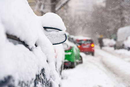 Cars Covered With Fresh White Snow After A Heavy Blizzard In Bucharest City