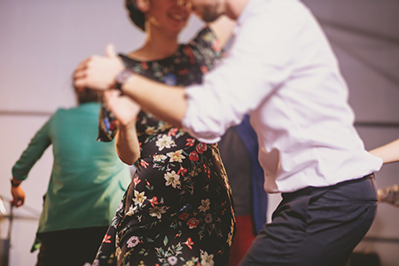 couple dance; swing dances on a ballroom club