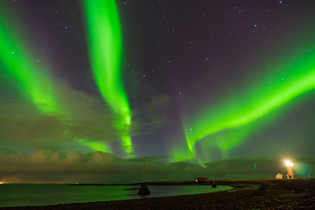 Northern lights Aurora Borealis above landscape