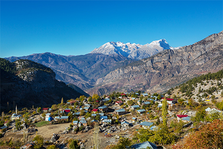 Mountain village with the view of Himalayas