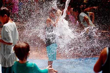 children Getting splashed by water