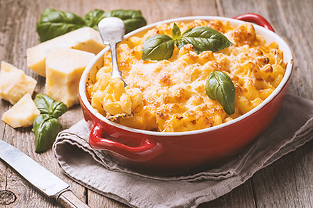 american style macaroni pasta in cheesy sauce