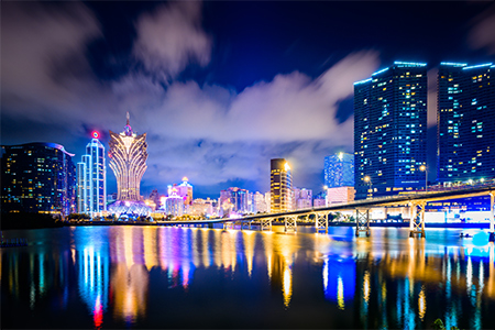 Macau cityscape at night, all hotel and tower are colorful lighten up with blue sky, Macau, China