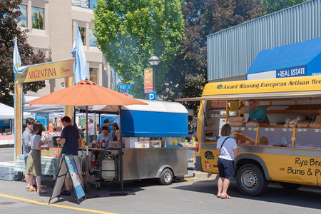 Penticton, British Columbia/Canada - June 15, 2019: people purchasing food at the Penticton Communit