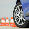 sport wheel photographed with red and white cones