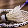 A closeup selective focus shot of badminton on a white surface