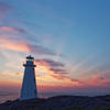 Beautiful historic Cape Spear Lighthouse on the Atlantic Coast at sunrise.