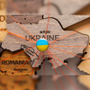 Ukraine flag pins and red thread for traveling and planning trip