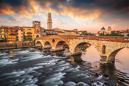 Verona, Italy Town Skyline on the Adige River with Ponte Pietra at dawn