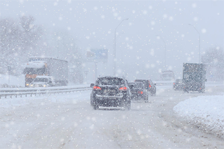 Cars driving in the snow