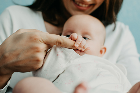 Mom playing with her child