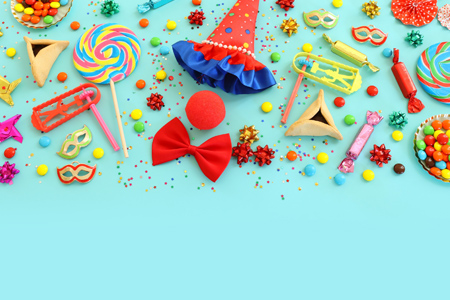 Flat lay composition with carnival accessories on color background.