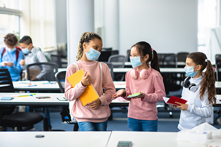 kids wearing masks in classroom