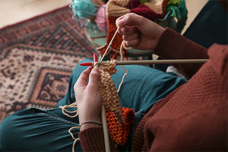 knitting scarf, partial view