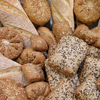 Bread background. Various kinds of bread with sesame seeds.