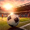 Soccer ball on the field of stadium at sunset