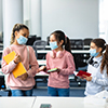 kids wearing masks in classroom