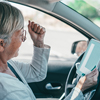 One old woman getting the pass to drive a car