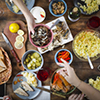 image of dinner table with different food.