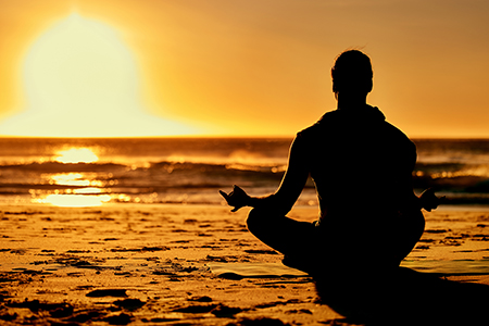 yoga and silhouette of man at beach outdoors for health and wellness