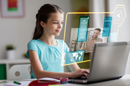 student girl having online class on laptop at home