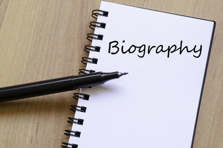 notepad with text Biography in black ink