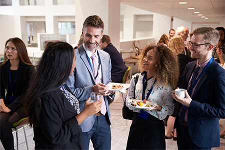 Delegates Networking During Conference