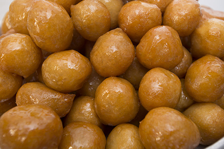 Pastries made of deep fried dough soaked in sugar syrup or honey