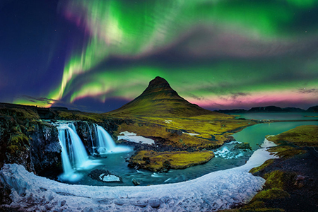  Northern Light, Aurora borealis at Kirkjufell in Iceland. Kirkjufell mountains in winter