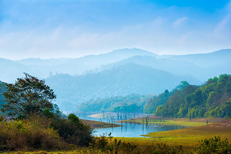 beautiful landscape at mystical day with mountains and lake, travel background, Periyar National Par