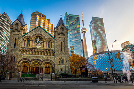 Panoramic view of St Andrew's Presbyterian Church and CN Tower - Toronto