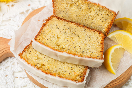 Homemade lemon cake with poppy seeds and sugar glaze. Selective focus